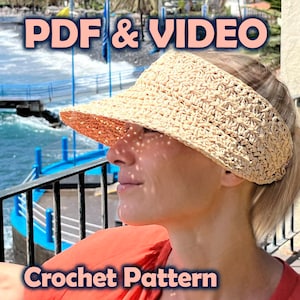 May include: A light beige crocheted visor with a wide brim, worn by a person. The visor is made of a woven material, casting a patterned shadow on the face. Text on the image reads "PDF & VIDEO" and "Crochet Pattern".