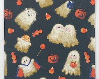 May include: Square Halloween-themed paper napkin with a dark blue background. The design features cartoon ghosts, candy corn, jack-o'-lanterns, and wrapped candies. The ghosts have various expressions and costumes, creating a festive and playful look.