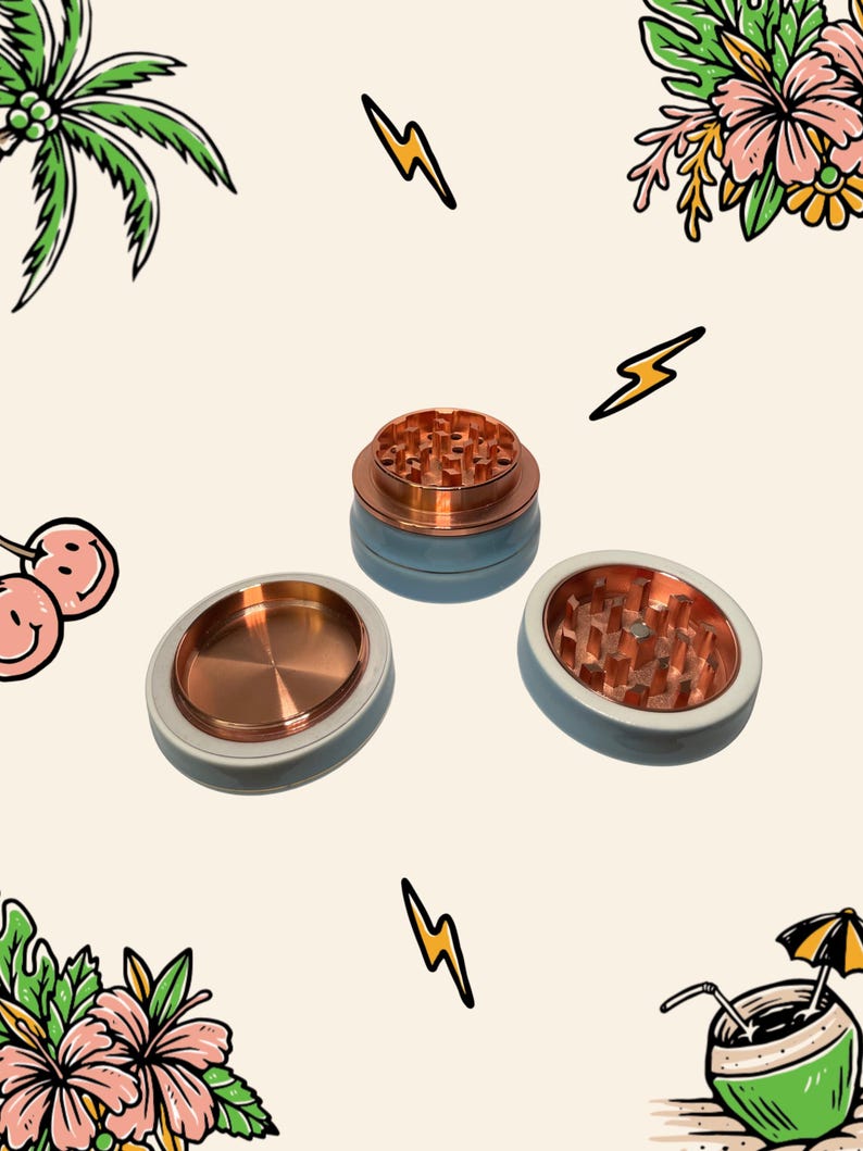 May include: A three-piece herb grinder featuring a metallic copper interior with sharp teeth and a smooth, light blue exterior casing. The set is displayed in three separate components, showing the top, middle, and bottom sections of the device.