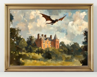 May include: A framed painting depicts a castle with a dragon soaring above. The castle is a warm orange color, set amidst green trees and a cloudy sky. The dragon is dark, with outstretched wings. The frame is gold.