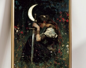 May include: A framed print of a painting depicting a woman in a dark dress, seated in a field of flowers, with a sword and a crescent moon in the background. The artwork has a vintage aesthetic with a gold frame.