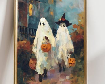 May include: A framed painting depicts two figures in white ghost costumes, holding orange jack-o'-lantern buckets, walking down a path. One figure wears a witch hat. The artwork has a painterly style with a gold frame, perfect for Halloween decor.