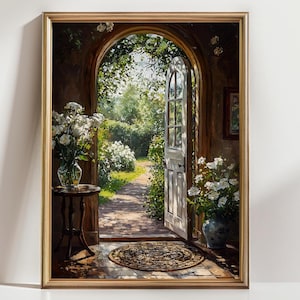 May include: A framed painting depicts an open doorway leading to a sunlit garden. White flowers in vases and a small table are in the foreground. The doorway is arched, with a white door and a glimpse of a path lined with greenery.