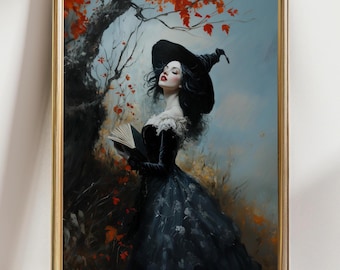 May include: A framed art print depicts a woman in a black witch hat and gown, holding a book under a tree with red leaves. The artwork has a vintage, gothic aesthetic with a soft, painterly style. The background is a blend of blue and gold.