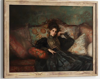 May include: A framed oil painting depicting a person with dark hair wearing a dark, high-collared garment, reclining on an ornate sofa with red and patterned upholstery. The artwork features deep shadows and rich, warm tones in a wooden frame.