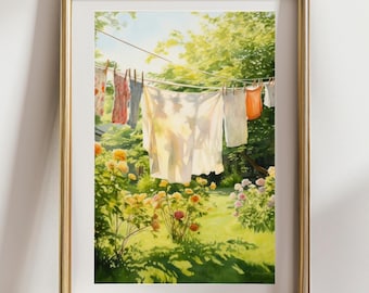 May include: Watercolor painting of laundry hanging on a clothesline in a sunny garden. The artwork features white, orange, and patterned clothing items. Lush green foliage and yellow and pink flowers surround the clothesline, with a golden frame.