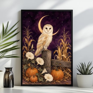 May include: A framed wall art print featuring a barn owl perched on a wooden fence post. The scene includes orange pumpkins, white morning glory flowers, and dried corn stalks against a dark purple night sky with a golden crescent moon.