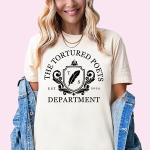 a woman wearing a t - shirt that says the featured boss department