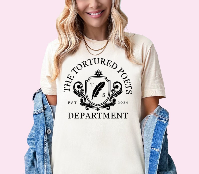 a woman wearing a t - shirt that says the featured boss department