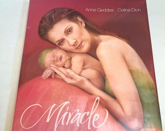 Vintage Photography Book &quot;Miracle&quot; By Ann Geddes & Celine Dion 11.5&quot;x13&quot; Copyright 2004 With Miracle DVD Footage Collectible.