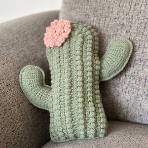 Crochet cactus decorative throw pillow with flower