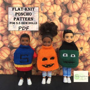May include: A PDF pattern for flat-knit ponchos for 5.5 inch dolls. Three dolls are wearing the ponchos, one is orange with a pumpkin face, one is green with a monster face, and one is blue with a letter S. The dolls are standing in front of a background of orange pumpkins.