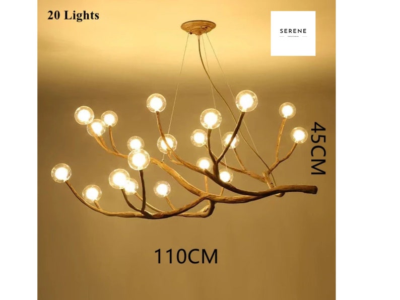 May include: A 20-light chandelier with a unique branch design. The chandelier is made of natural wood branches with clear glass globes. The chandelier measures 45 inches in height and 110 inches in width.
