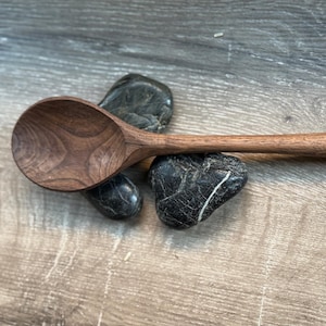 Large rounded walnut cooking spoon
