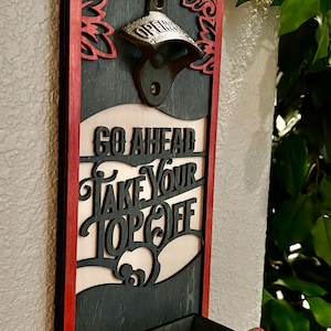 Wall mounted BEER:30 bottle opener.