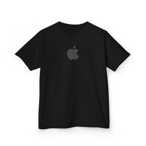 May include: Black t-shirt featuring a gray Apple logo centered on the chest. The short-sleeved shirt is made of a soft material and is suitable for casual wear. The Apple logo is a simple, recognizable design.
