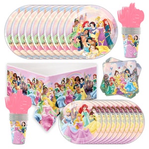 May include: A party set with Disney princess designs. The set includes plates, cups, napkins, forks, and a tablecloth. The plates and cups feature multiple princesses. The tablecloth has a pink background with a castle and rainbow, ideal for a princess-themed party.