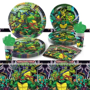 May include: A Teenage Mutant Ninja Turtles party set, including plates, napkins, cups, and cutlery. The items are decorated with images of the characters. The plates are round, and the napkins are square. The color scheme is predominantly green, yellow, and red.