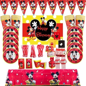 May include: Mickey Mouse themed party supplies, including red and yellow plates, cups, napkins, table cover, and a banner that says "Happy Birthday".