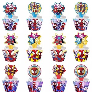 May include: Twelve cupcake wrappers featuring Spider-Man and his friends. The wrappers are red, blue and yellow with images of Spider-Man, Miles Morales and Gwen Stacy. The wrappers are decorated with stars, circles and the text "Spidey and his Amazing Friends".