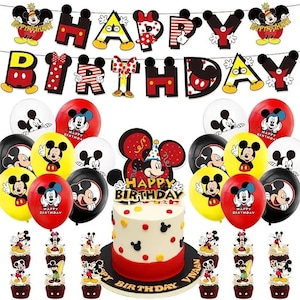 May include: A colourful birthday party display featuring Mickey Mouse. The scene includes a cake, cupcakes, balloons, and a banner that reads "Happy Birthday." The cake has white, red, and black details, and the balloons are red, yellow, black, and white.