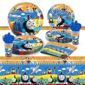 May include: A Thomas the Tank Engine party supplies set with blue and orange plates, cups, napkins, and a table runner. The set features Thomas the Tank Engine and his friends.