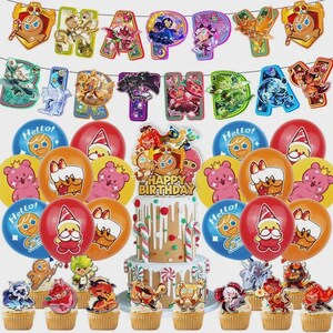 May include: A colourful birthday party display featuring a cake, cupcakes, balloons, and a banner spelling "Happy Birthday." The cake is adorned with candy canes and character toppers. Balloons display cartoon characters and the word "Hello!"