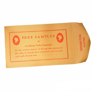 May include: A brown paper envelope with red text that reads "FREE SAMPLES" and "La Dainty Toilet Requisites" for the modern person of this age who appreciates the value of smooth, clear complexion and luxuriant and easily dressed hair. The envelope also has red text that reads "DISTRIBUTORS WANTED".