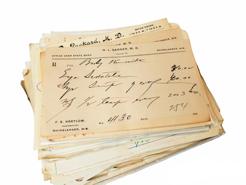 May include: A vintage prescription form with handwritten text, including the name "Packard, M. 20. M.D." and "Baby Hincaide". The form also includes the text "Eye Sedatole" and "203 h2".