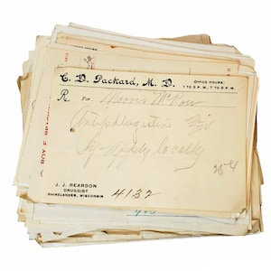 May include: A vintage prescription form from C. D. Packard, M.D. with handwritten text for "Mos Mou" for "Antiphlogistine" to be applied locally. The form is dated 4/13/32 and 28-4.