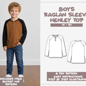 May include: A sewing pattern for a boys raglan sleeve henley top in sizes 1Y-8Y. The image displays a child wearing a brown and black long-sleeve henley shirt with blue jeans, alongside a technical line drawing of the front and back of the garment.