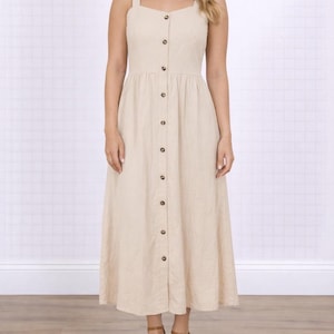 Woman wearing a beige Button Down Sweetheart Long Dress on a white background.