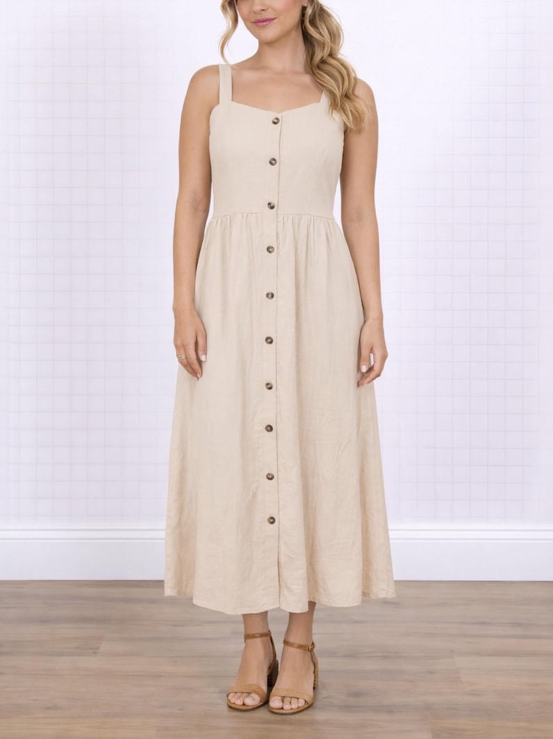 Woman wearing a beige Button Down Sweetheart Long Dress on a white background.