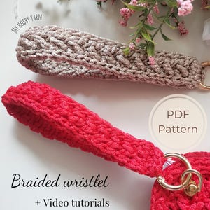 May include: Two braided wristlets, one beige and one red, with gold-colored metal rings. The red wristlet is attached to a small pouch. Text on the image reads "Braided wristlet + Video tutorials" and "PDF Pattern".