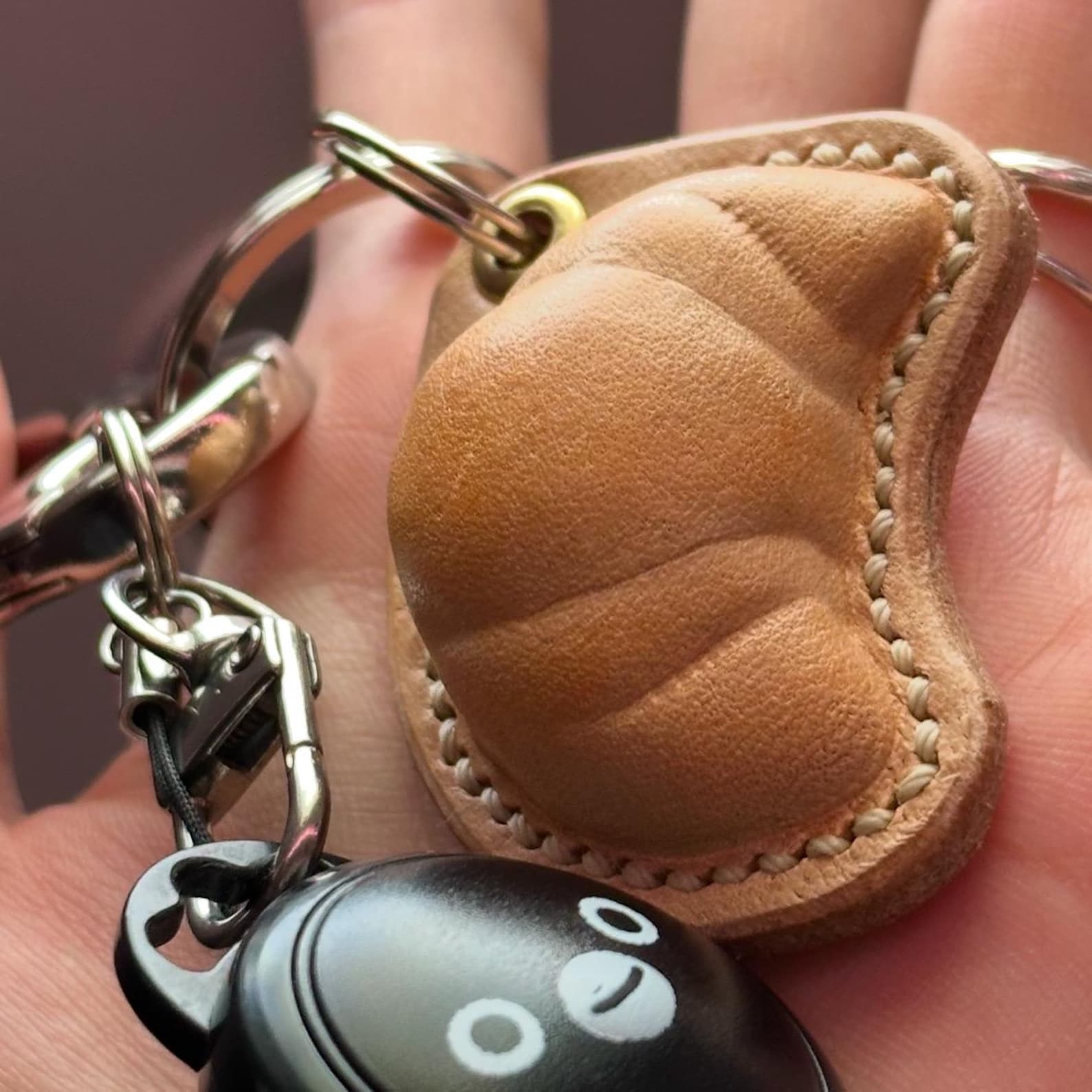 HAND-PAINTED CROISSANT BAG CHARM + KEYCHAIN main image 1