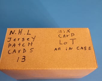 NHL JERSEY PATCH cards, 13 in a box, with magnetic cases. mostly. 12 of 13 are.