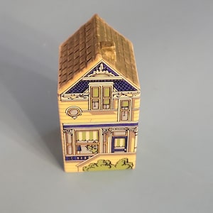WADE yellow  painted lady&#39;s  house
