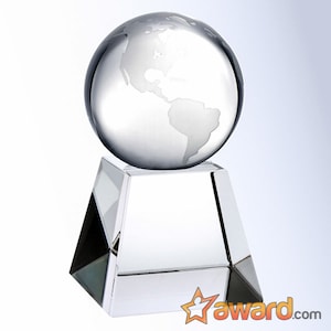 May include: A clear glass globe with a frosted etched world map sits atop a clear glass square base. The globe is a crystal award.