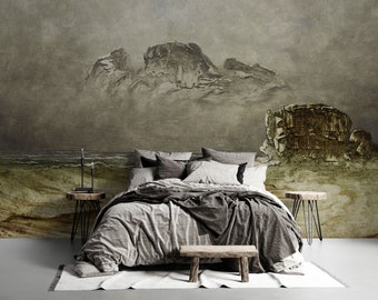 May include: A gray and white bed with a gray duvet cover and a wooden bench at the foot of the bed. The bed is in front of a wall with a large painting of a seascape with mountains in the background.