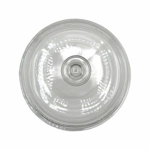 May include: A clear glass lid with a circular design. The lid has a central knob with a square indentation and concentric rings. The glass is transparent, allowing light to pass through. The lid is likely for a serving dish or bowl.