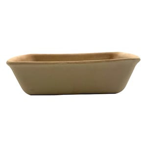 May include: A rectangular, light brown disposable bowl. The bowl has a slightly rounded rim and is made of a natural, earthy material. The sides slope gently inward, and the overall shape is simple and functional.