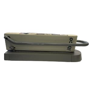 May include: A light beige ibico paper punch machine with a gray handle and base. The machine has the brand name "ibico" printed on the side. The handle is curved and extends over the top of the machine.