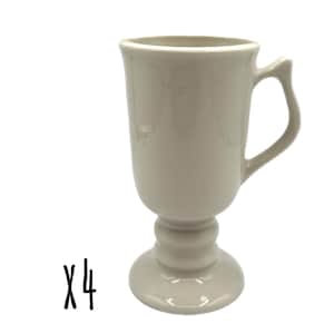 May include: Four off-white ceramic mugs with a pedestal base and curved handle. The mugs have a tall, slender shape and a smooth, glossy finish. The number "X4" is written in black on the lower left.