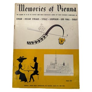 May include: Vintage "Memories of Vienna" sheet music cover. The cover features the title in elegant script, with illustrations of silhouettes, a cityscape, and decorative elements. The cover is yellow and cream colored.