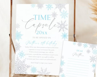 May include: A printable time capsule for a birthday celebration. The white card has a blue and silver snowflake design and the text "Time Capsule to be opened on 20XX Matthew's 18th birthday". The card includes instructions for writing a message to the birthday person. A second card with a similar design says "Dear Matthew".