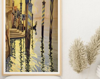 May include: A vintage travel poster featuring a view of a canal in Venice, Italy. The poster shows a series of striped poles reflecting in the water. The poles are lined up in a row, and the water is a light blue color. The poster is framed in a wooden frame.