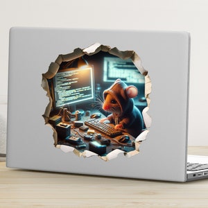 May include: A computer screen with code visible on the screen. A mouse wearing a blue hoodie is sitting at a keyboard. The image is a sticker on a laptop.