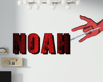 May include: A red and black Spiderman themed wall decal with the name NOAH written in bold letters. The decal features a Spiderman hand with a web shooting out of the fingers.