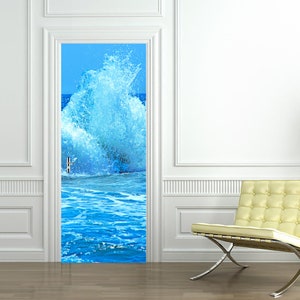 May include: A door decal featuring a large blue wave crashing against the ocean. The wave is a bright blue with white foam and the ocean is a lighter blue.