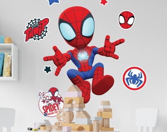 May include: A red and blue Spider-Man wall decal set with a large image of Spider-Man in a jumping pose. The set includes smaller images of Spider-Man, stars, and a web design with the word "TawiP".